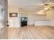 Inviting living room showcasing wood floors, and an open layout with an aquarium at 1062 Pinon Ln, Elizabeth, CO 80107