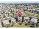 Aerial view of a residential neighborhood showcasing well-maintained homes and landscaping at 23580 E Portland Way, Aurora, CO 80016