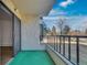 Relax on this private balcony, complete with durable outdoor carpeting and scenic neighborhood views at 13992 E Marina Dr # 109, Aurora, CO 80014