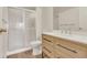 Modern bathroom features a vanity and a shower with sliding glass doors at 13992 E Marina Dr # 109, Aurora, CO 80014