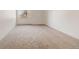 Spacious bedroom with plush carpeting and a window, offering a cozy retreat at 13992 E Marina Dr # 109, Aurora, CO 80014