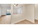Inviting living space with wood floors, an open floorplan, and a view to a private balcony at 13992 E Marina Dr # 109, Aurora, CO 80014