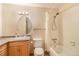 Functional bathroom with a shower-tub combo and a single sink vanity at 31084 Kings Valley Dr, Conifer, CO 80433