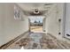 Empty garage with attached garage door opener and view through garage at 436 Pluto Ct, Lone Tree, CO 80124