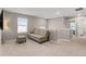 Cozy loft area with neutral colored futon and ottoman near a bright window at 2186 Prairie Smoke Dr, Monument, CO 80132