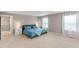 Bright main bedroom with neutral paint, plush carpeting, and ample closet space at 2186 Prairie Smoke Dr, Monument, CO 80132