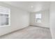 Spacious bedroom featuring a large window and plush carpeting at 759 N Deer Park St, Watkins, CO 80137