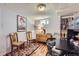 Cozy basement office space with natural light, charming decor, and built-in shelving at 1559 Elm St, Denver, CO 80220