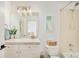 Bathroom vanity with chrome fixtures, decor, and a view into a bedroom at 150 S Harrison St # 106, Denver, CO 80209