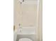 Bathroom tub with shower and curtain at 150 S Harrison St # 106, Denver, CO 80209