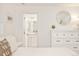 Bedroom with a view into the Primary bathroom at 150 S Harrison St # 106, Denver, CO 80209