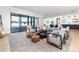 Finished basement with comfortable seating and large windows at 2442 Fox View Trl, Franktown, CO 80116