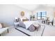 Spacious bedroom with sitting area and large window at 2442 Fox View Trl, Franktown, CO 80116