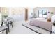 Bright bedroom with sitting area and large window at 2442 Fox View Trl, Franktown, CO 80116