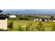 Panoramic view of a beautiful community with mountain views in the background at 2442 Fox View Trl, Franktown, CO 80116