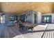 Spacious deck with a modern dining set and comfortable seating at 2442 Fox View Trl, Franktown, CO 80116