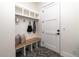 Convenient entryway with built-in bench and storage at 2442 Fox View Trl, Franktown, CO 80116