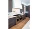 Gourmet kitchen with high-end stainless steel range and custom cabinetry at 2442 Fox View Trl, Franktown, CO 80116