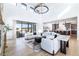 Open concept living and kitchen area with high ceilings at 2442 Fox View Trl, Franktown, CO 80116