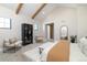 Main bedroom with high ceilings and sliding barn door to the en suite at 2442 Fox View Trl, Franktown, CO 80116