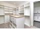 Large walk-in closet with ample shelving and drawers at 2442 Fox View Trl, Franktown, CO 80116