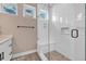 Elegant bathroom with a glass enclosed shower, built-in bench, and modern fixtures at 3219 W 19Th Ave # 3, Denver, CO 80204