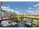 Relaxing deck area with comfortable seating and a view of the community and landscape at 42311 Forest Oaks Dr, Elizabeth, CO 80107