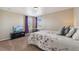 Bedroom with large bed and flatscreen TV at 42311 Forest Oaks Dr, Elizabeth, CO 80107