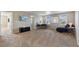 Bright bonus room featuring comfortable seating, a TV, and ample space for work or leisure at 42311 Forest Oaks Dr, Elizabeth, CO 80107