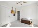 Well-lit bedroom with guitars hanging on the wall and ample space for relaxing or creative pursuits at 422 Atwood St, Longmont, CO 80501