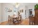 Charming dining room featuring hardwood floors and a view to the yard at 422 Atwood St, Longmont, CO 80501