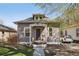 Charming bungalow featuring a well-maintained lawn, classic architecture and off street parking at 422 Atwood St, Longmont, CO 80501
