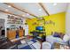 Unique living space with kitchenette, workspace, and relaxation area, showcasing versatile functionality at 422 Atwood St, Longmont, CO 80501