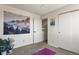 Bedroom with a mountain mural, open closet door, and closet providing ample space at 265 N Holcomb St, Castle Rock, CO 80104