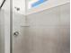An elegant tile shower features a sleek design at 9069 Pitkin St, Commerce City, CO 80022