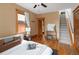 Bedroom featuring hardwood floors, natural light, and stairs at 1267 Clayton St, Denver, CO 80206