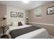 Serene bedroom with soft lighting, neutral tones, and simple decor for a relaxing ambiance at 1267 Clayton St, Denver, CO 80206