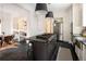 Spacious kitchen featuring a large island with cooktop and stainless steel appliances at 1267 Clayton St, Denver, CO 80206