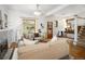 Inviting living room with hardwood floors, neutral furnishings, and plenty of natural light at 1267 Clayton St, Denver, CO 80206