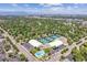 Beautiful aerial view featuring neighborhood tennis courts and a community pool at 6330 E Vassar Ave, Denver, CO 80222