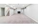 Finished basement with fireplace, neutral carpet, and recessed lighting at 6330 E Vassar Ave, Denver, CO 80222