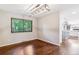 Bright dining room with hardwood floors and a view to the kitchen at 6330 E Vassar Ave, Denver, CO 80222