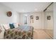 Cozy bedroom with carpet floors, a mirrored closet, and ample lighting at 3131 E Alameda Ave # 1107, Denver, CO 80209