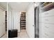 Spacious walk-in closet with custom shelving and storage solutions at 3131 E Alameda Ave # 1107, Denver, CO 80209