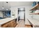 Open kitchen features granite countertops, modern appliances, and a seamless transition to the living area at 3131 E Alameda Ave # 1107, Denver, CO 80209