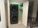 Convenient laundry area featuring an LG WashTower and shelving for storage at 3131 E Alameda Ave # 1107, Denver, CO 80209