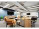 Relaxing resident lounge with plush seating, large screen TVs, and modern decor at 3131 E Alameda Ave # 1107, Denver, CO 80209