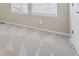 Bedroom with carpet, neutral walls, and window with blinds at 3006 W 107Th Pl # D, Westminster, CO 80031