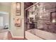 Bathroom with a clear glass shower and a tub at 7462 S Quail Cir # 426, Littleton, CO 80127