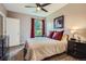 Cozy bedroom with natural light, carpet, and black furniture at 7462 S Quail Cir # 426, Littleton, CO 80127